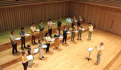 Image of the choir on stage