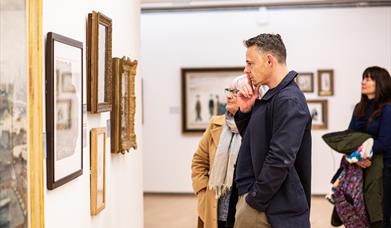People looking at exhibition