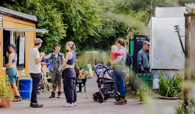 Image of people at an outdoor market