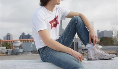 Model wearing Levi's clothing.